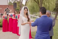 bride put the ring on groom's finger