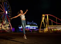 Senior portrait at the Greater Gulf State Fair in Mobile, Alabama — jumping