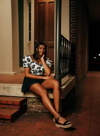 Senior portrait in downtown Mobile, Alabama — posing