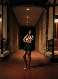 Senior portrait in downtown Mobile, Alabama — posing