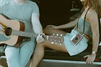 engagement shoot, couple sitting inside a car cuddling, Sunshine Coast