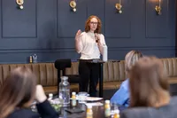 Jill Wright presenting practical strategies for planning, prioritization, and workload management during a workplace workshop.