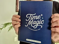 Close-up of the Time Magic Planner cover held in someone's hands.