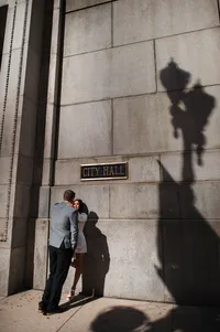 Couple embracing near Chicago City Hall after their elopement ceremony