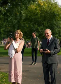 Mom and Dad taking photos at Boston Public Garden
