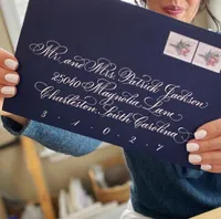 Elegant blue envelope with custom calligraphy