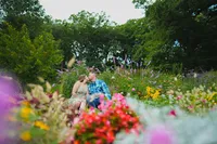 Iowa true-tone vibrant photographer captures couple with peak summer florals at the Des Moines Rose Garden