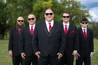 Iowa Wedding black tux red tie groomsmen portrait