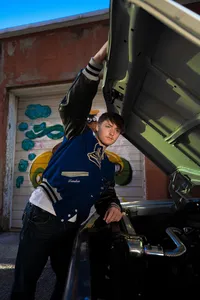 Des Moines Downtown Senior Session Downtown with vintage car with graffiti wall