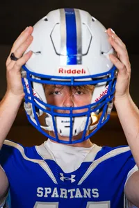 Iowa Senior Photo Blue uniform with helmet