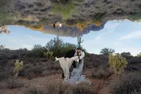 Double Exposed Artistic Photography of western hispanic elopement wedding couple kiss dip cactus mountain scottsdale az