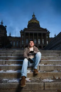 Iowa State Capitol Senior portrait on staircase at twilight
