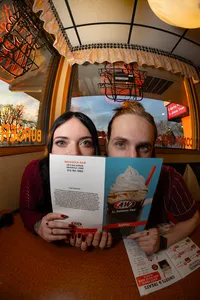 Des Moines Alternative Moody Playful engagment session with A&W Rootbeer Menu