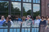 Iowa wedding outdoors at The Monroe wedding venue guests seated for ceremony