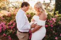 Maternity Photos in Charleston, SC -- Expectant mother poses for Maternity Portraits at Hampton Park in downtown Charleston, SC.