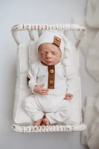 Newborn Photographer in Charleston - Infant posed for Newborn Photoshoot at Holy City Babies Portrait Studio in Charleston, SC.