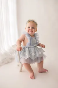 Baby celebrates her first birthday with Cake Smash Pictures at Holy City Babies Portrait Studio in Charleston, SC.