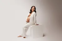 Expectant Mother poses for Studio Maternity Portraits in Charleston, South Carolina.