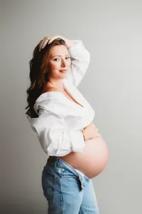 Pregnant mother poses for Fine Art, Editorial Style Studio Maternity Portraits in Charleston, SC.