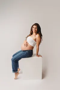 Editorial Studio Maternity Photoshoot - Pregnant mother poses for Editorial Studio Maternity Portraits at Holy City Babies in Charleston, SC.