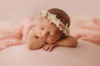 Infant posed for Newborn Baby Photos at Holy City Babies Portrait Studio in Charleston, SC.