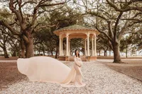 Maternity Photos in Charleston, SC -- Expectant mother poses for Maternity Portraits at White Point Garden in downtown Charleston, SC.