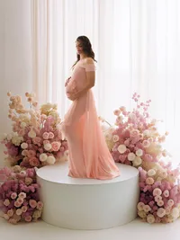 Expectant mother poses for Luxury, Editorial Style Studio Maternity Portraits at Holy City Babies Portrait Studio in Charleston, SC.