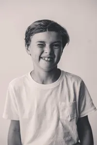 Little boy poses for Personality Portraits at Holy City Babies Portrait Studio in Charleston, South Carolina.