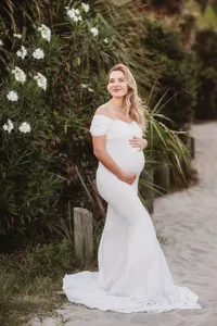 Expectant mother poses for Maternity Portraits on Folly Beach.
