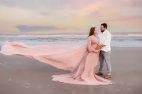 Expectant parents pose for Beach Maternity Photos during their Babymoon in Charleston, SC.