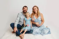 Charleston, SC #1 Newborn Photographer poses infant for Newborn Photoshoot in Charleston Portrait Studio.