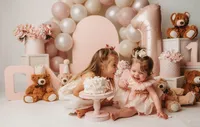 Charleston Cake Smash Photographer- Baby looks into the camera during Cake Smash Photos at Holy City Babies Portrait Studio in Charleston, SC.