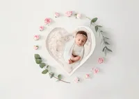Infant posed for Newborn Baby Photos at Holy City Babies Portrait Studio in Charleston, SC.