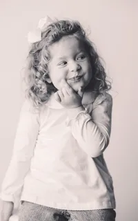 Toddler poses for Personality Portraits at Holy City Babies Portrait Studio in Charleston, SC.