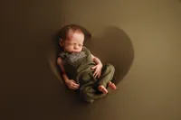 Newborn Photographer in Charleston - Newborn Baby sleeping during Newborn Portrait Session in Charleston, SC.