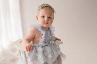 Baby celebrates her first birthday with Cake Smash Pictures at Holy City Babies Portrait Studio in Charleston, SC.