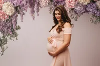 Expectant Mother poses for Luxury, Editorial Style Studio Maternity Portraits at Holy City Babies Portrait Studio in Charleston, SC.