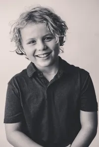Young boy poses for Personality Portraits in Charleston, South Carolina.