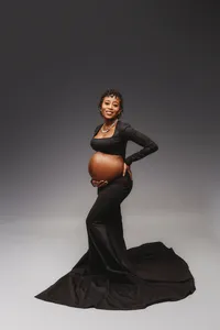 Pregnant mother poses for Fine Art, Editorial Style Studio Maternity Portraits in Charleston, SC.