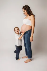 Editorial Studio Maternity Photoshoot - Pregnant mother poses for Editorial Studio Maternity Portraits at Holy City Babies in Charleston, SC.