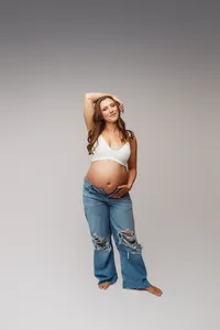 Expectant mother poses for Studio Maternity Portraits at Holy City Babies Portrait Studio in Charleston, SC.