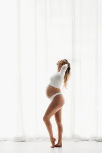 Charleston Maternity Photographer - Pregnant woman poses for Fine Art, Editorial Maternity Portraits at Holy City Babies Portrait Studio in Charleston, SC.
