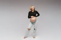Charleston Maternity Photographer - Pregnant woman poses for Fine Art, Editorial Maternity Portraits at Holy City Babies Portrait Studio in Charleston, SC.
