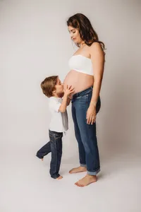 Editorial Studio Maternity Photoshoot - Pregnant mother poses for Editorial Studio Maternity Portraits at Holy City Babies in Charleston, SC.