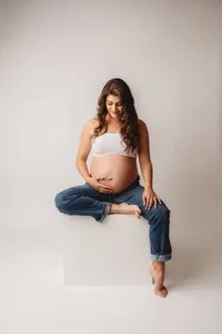Editorial Studio Maternity Photoshoot - Pregnant mother poses for Editorial Studio Maternity Portraits at Holy City Babies in Charleston, SC.