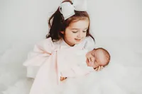 Infant posed for Newborn Photos in Charleston, SC.