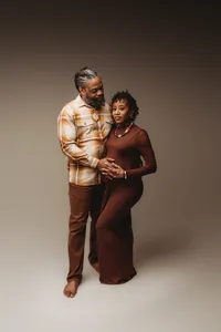 Pregnant mother poses for Fine Art, Editorial Style Studio Maternity Portraits in Charleston, SC.