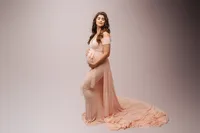 Editorial Studio Maternity Photoshoot - Pregnant mother poses for Editorial Studio Maternity Portraits at Holy City Babies in Charleston, SC.