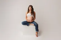 Editorial Studio Maternity Photoshoot - Pregnant mother poses for Editorial Studio Maternity Portraits at Holy City Babies in Charleston, SC.