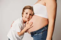 Editorial Studio Maternity Photoshoot - Pregnant mother poses for Editorial Studio Maternity Portraits at Holy City Babies in Charleston, SC.